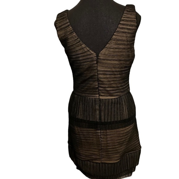 BCBG black dress in size Medium. Place offer I will defently consider Thanks. - Picture 2 of 10